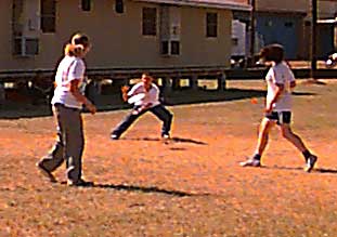 Students playing ultimate frisbee.
