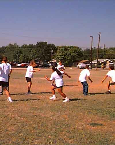 Students playing ultimate frisbee.