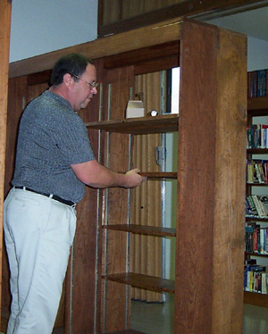 David Orozco Installing Additional Shelving