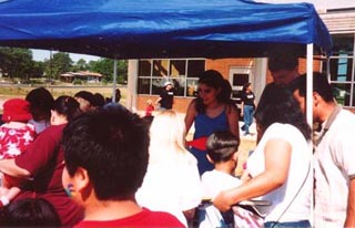 Families in line to make a poem